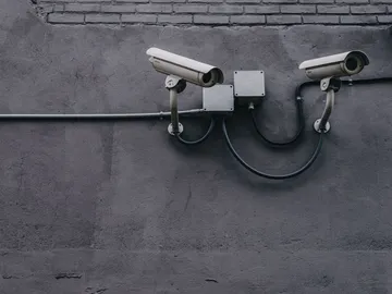 CCTV and fire alarm installation in Pakistan: CCTV cameras on a wall (stock photo)