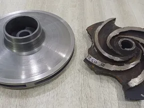 Reverse engineered impeller beside the original