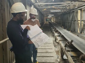 Mechanical fabrication and welding in Pakistan: engineers reviewing fabrication drawings on site