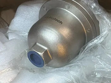 Machined mechanical component in protective packing